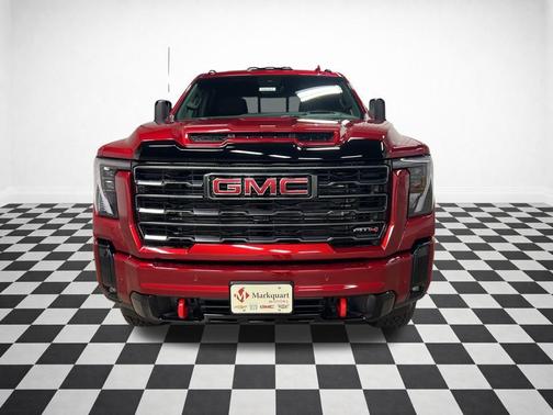 Volcanic Red Tintcoat 2026 GMC Sierra 2500 AT4
