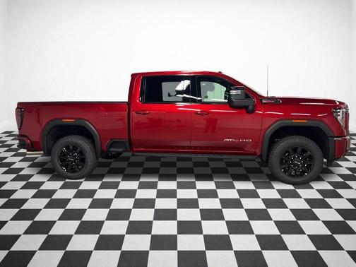 Volcanic Red Tintcoat 2026 GMC Sierra 2500 AT4