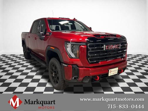 Volcanic Red Tintcoat 2026 GMC Sierra 2500 AT4