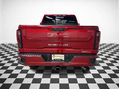 Volcanic Red Tintcoat 2026 GMC Sierra 2500 AT4