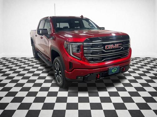 Volcanic Red Tintcoat 2025 GMC Sierra 1500 AT4