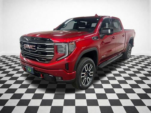Volcanic Red Tintcoat 2025 GMC Sierra 1500 AT4