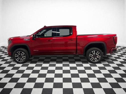 Volcanic Red Tintcoat 2025 GMC Sierra 1500 AT4