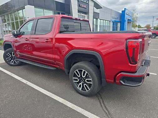 Volcanic Red Tintcoat 2025 GMC Sierra 1500 AT4