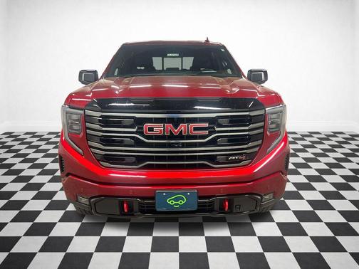 Volcanic Red Tintcoat 2025 GMC Sierra 1500 AT4