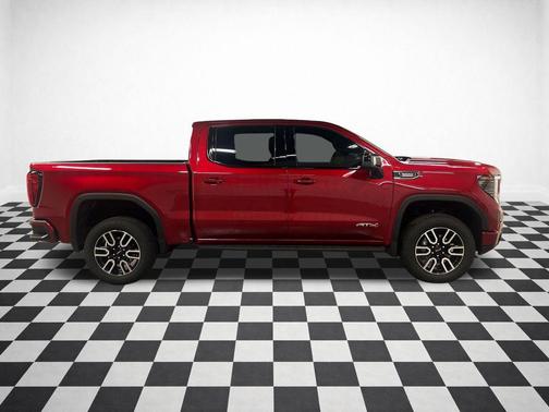 Volcanic Red Tintcoat 2025 GMC Sierra 1500 AT4