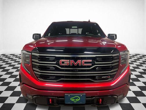 Volcanic Red Tintcoat 2025 GMC Sierra 1500 AT4