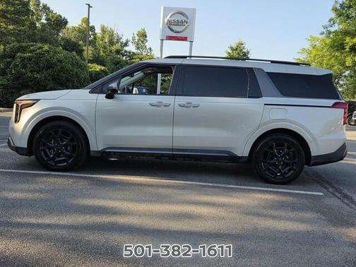Ivory 2025 Kia Carnival Hybrid SX