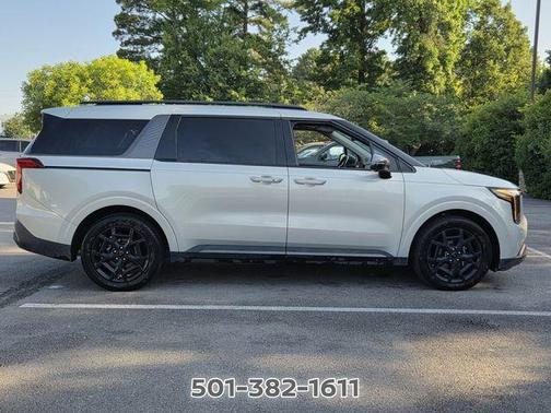 Ivory 2025 Kia Carnival Hybrid SX
