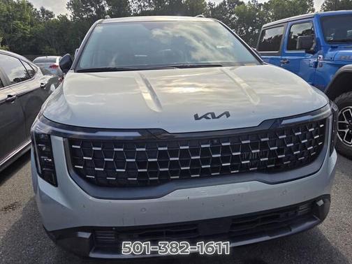 Ivory 2025 Kia Carnival Hybrid SX
