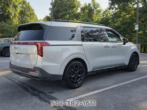 Ivory 2025 Kia Carnival Hybrid SX