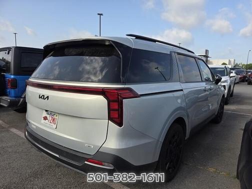 Ivory 2025 Kia Carnival Hybrid SX