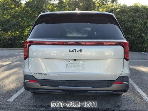 Ivory 2025 Kia Carnival Hybrid SX