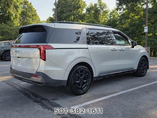 Ivory 2025 Kia Carnival Hybrid SX