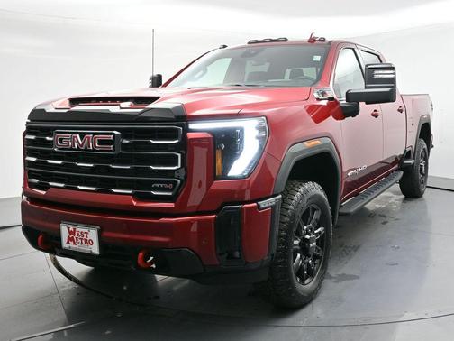 Volcanic Red Tintcoat 2026 GMC Sierra 3500 AT4