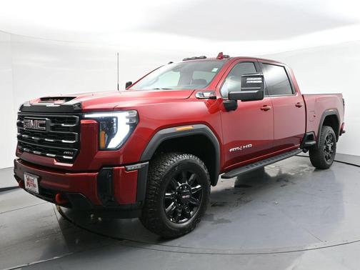 Volcanic Red Tintcoat 2026 GMC Sierra 3500 AT4