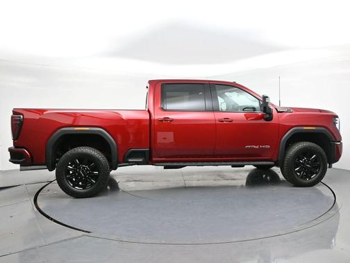 Volcanic Red Tintcoat 2026 GMC Sierra 3500 AT4