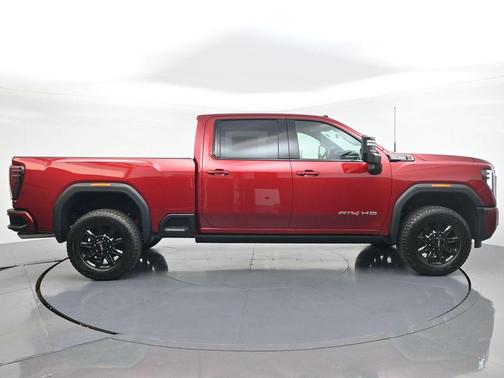 Volcanic Red Tintcoat 2026 GMC Sierra 3500 AT4