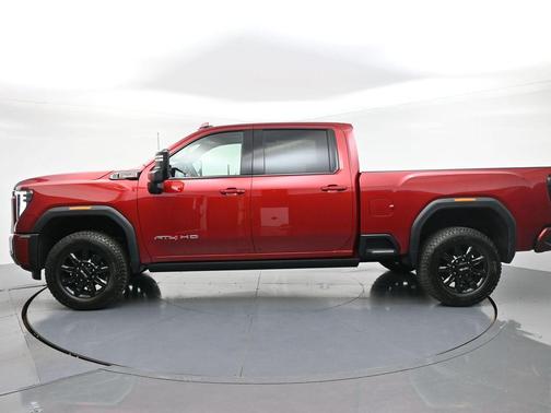 Volcanic Red Tintcoat 2026 GMC Sierra 3500 AT4