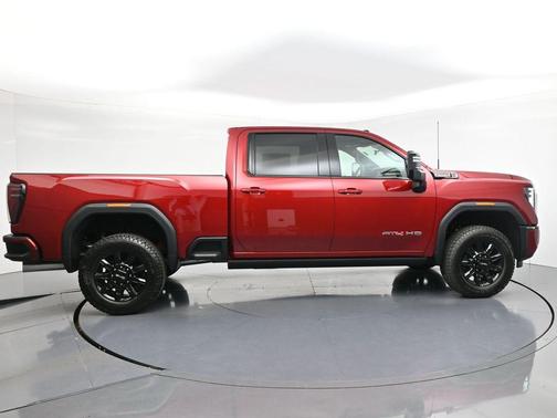 Volcanic Red Tintcoat 2026 GMC Sierra 3500 AT4