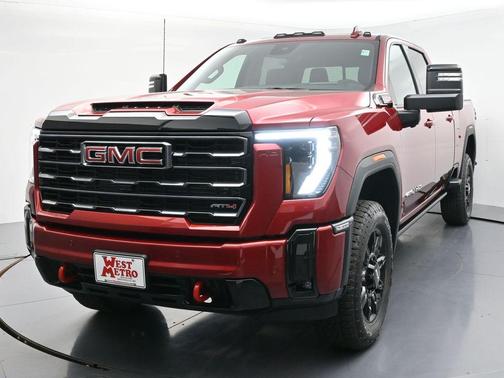 Volcanic Red Tintcoat 2026 GMC Sierra 3500 AT4