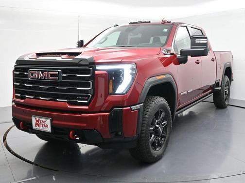 Volcanic Red Tintcoat 2026 GMC Sierra 3500 AT4