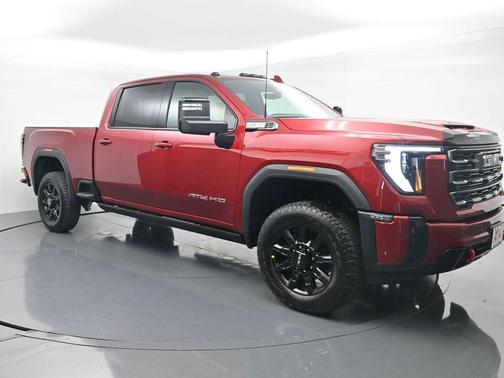 Volcanic Red Tintcoat 2026 GMC Sierra 3500 AT4