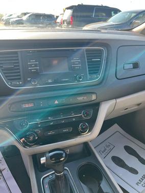 Burgundy 2015 Kia Sedona LX