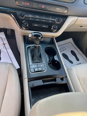 Burgundy 2015 Kia Sedona LX