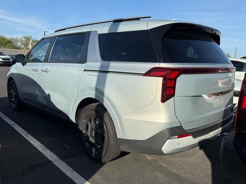 Ivory Silver 2026 Kia Carnival Hybrid EX