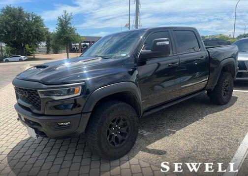 Diamond Black Crystal Pearlcoat 2025 RAM 1500 RHO Crew Cab 4x4 5'7' Box