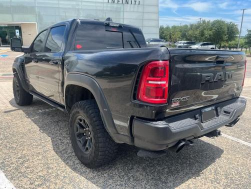 Diamond Black Crystal Pearlcoat 2025 RAM 1500 RHO Crew Cab 4x4 5'7' Box