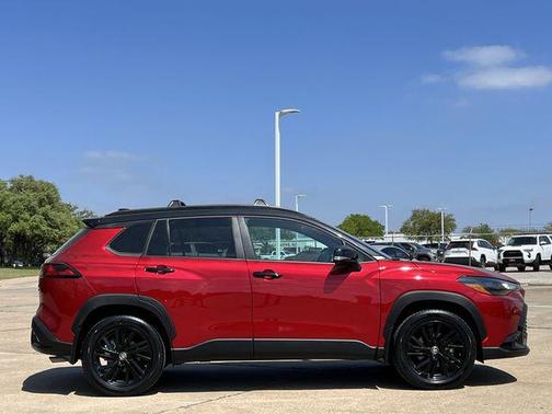 Soul Red Crystal/Jet Black 2025 Toyota Corolla Hybrid L
