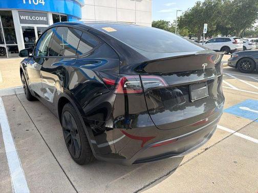 Solid Black 2025 Tesla Model Y Long Range Dual Motor Rear-Wheel Drive