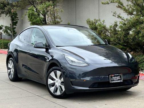 Solid Black 2024 Tesla Model Y Long Range Dual Motor All-Wheel Drive