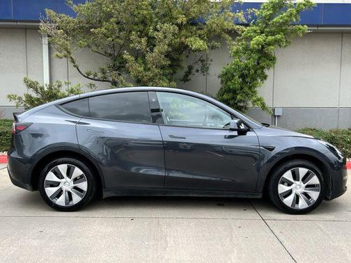 Solid Black 2024 Tesla Model Y Long Range Dual Motor All-Wheel Drive