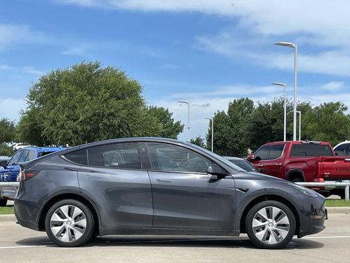 Solid Black 2024 Tesla Model Y Long Range Dual Motor All-Wheel Drive