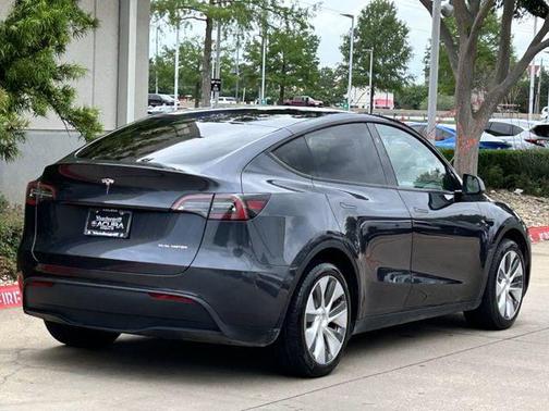 Solid Black 2024 Tesla Model Y Long Range Dual Motor All-Wheel Drive