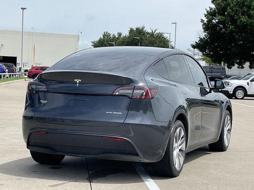 Solid Black 2024 Tesla Model Y Long Range Dual Motor All-Wheel Drive