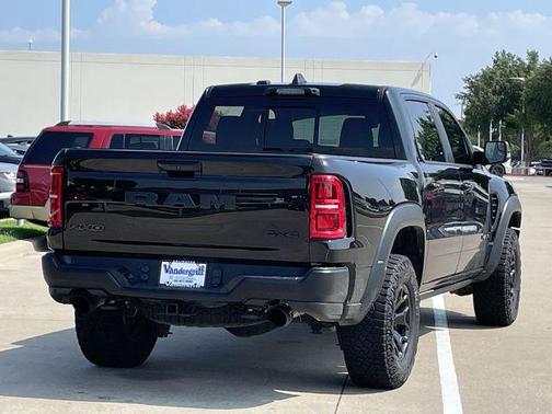 Diamond Black Crystal Pearlcoat 2025 RAM 1500 RHO Crew Cab 4x4 5'7' Box
