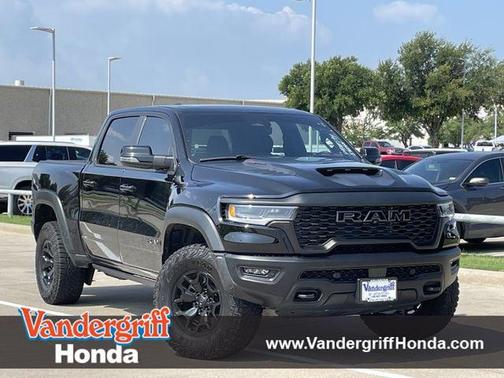 Diamond Black Crystal Pearlcoat 2025 RAM 1500 RHO Crew Cab 4x4 5'7' Box