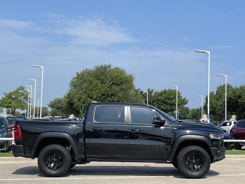 Diamond Black Crystal Pearlcoat 2025 RAM 1500 RHO Crew Cab 4x4 5'7' Box