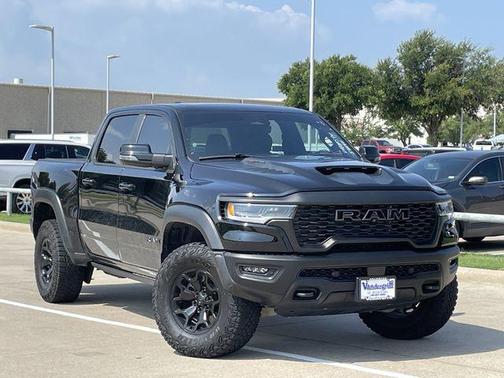 Diamond Black Crystal Pearlcoat 2025 RAM 1500 RHO Crew Cab 4x4 5'7' Box