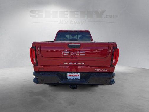 Volcanic Red Tintcoat 2026 GMC Sierra 1500 AT4X