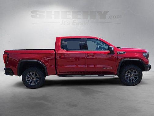 Volcanic Red Tintcoat 2026 GMC Sierra 1500 AT4X