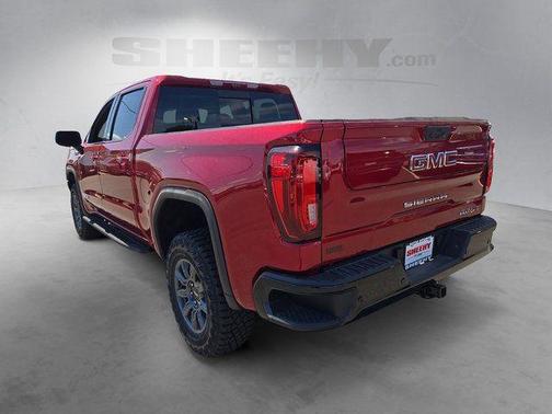 Volcanic Red Tintcoat 2026 GMC Sierra 1500 AT4X
