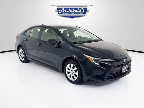Midnight Black Metallic 2026 Toyota Corolla Hybrid LE