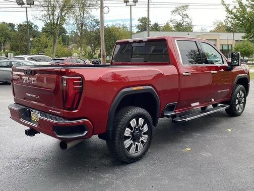 Volcanic Red Tintcoat 2024 GMC Sierra 2500 Denali