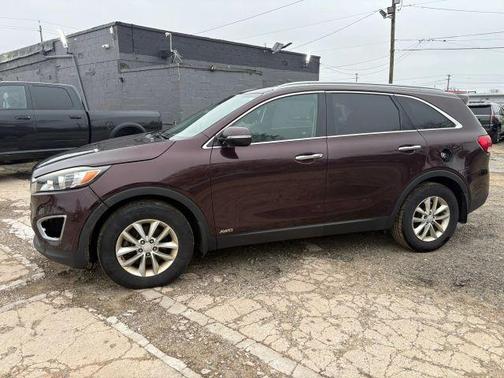 Burgundy 2016 Kia Sorento LX