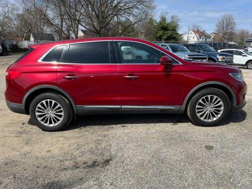 Red 2016 Lincoln MKX Select